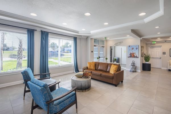 Bright lobby area with seating and natural light