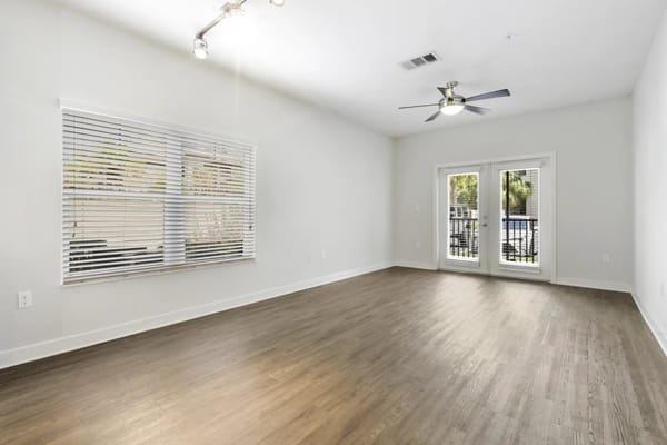 Bright interior room with natural light and wooden floors