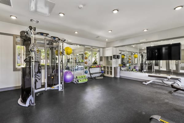 Interior view of a fitness center with exercise equipment