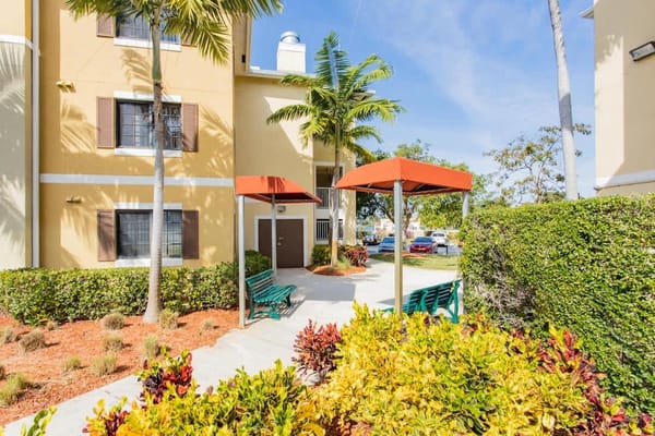 Well-maintained outdoor space with seating and landscaping