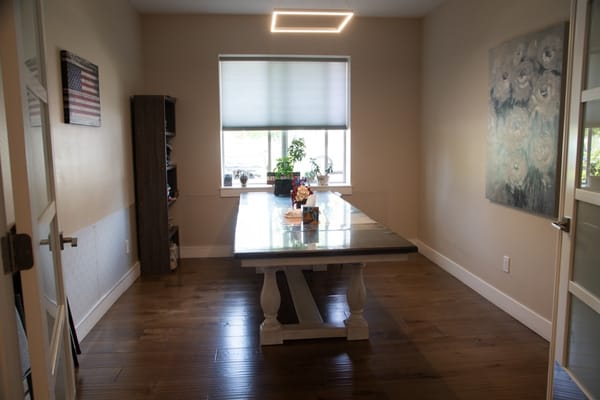 Bright interior space with a large table