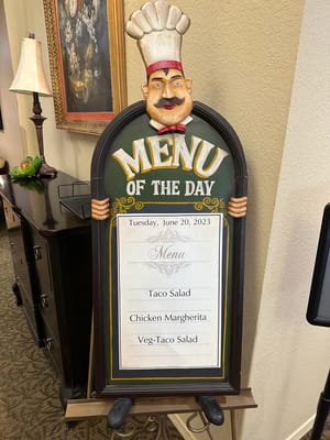 Menu of the day displayed in a dining area