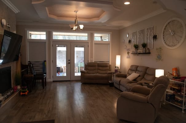 Cozy living room with seating and access to outdoor area