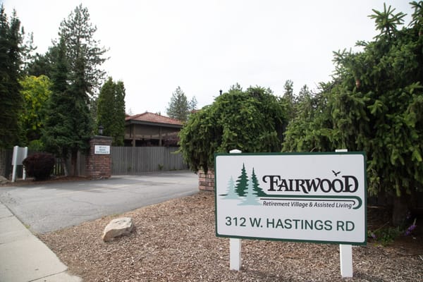 Fairwood Retirement Village entrance sign with building
