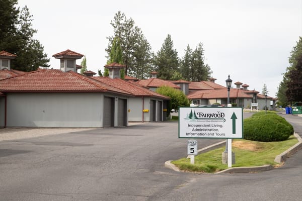 Exterior view of Fairwood Retirement Village with signage