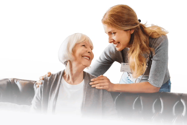 A caregiver interacting with a senior resident