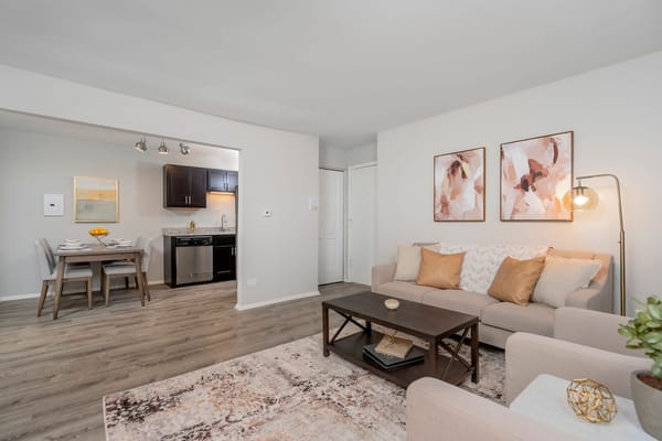 Cozy living room with modern decor and kitchen