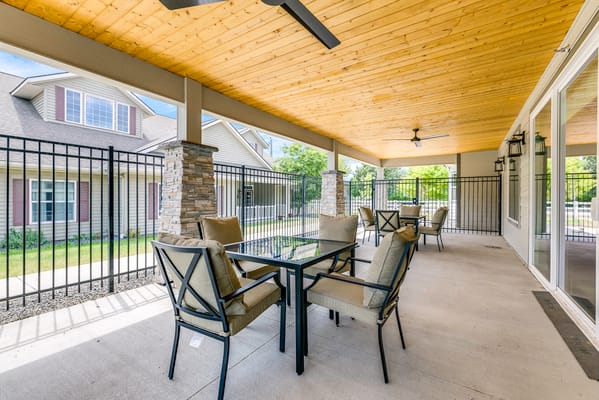 Outdoor patio area with furniture at Dalton Senior Living