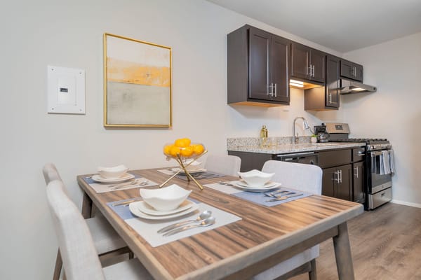 Stylish kitchenette with dining table set for two