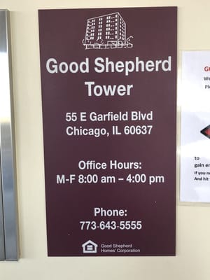 Signage with facility details at Good Shepherd Tower