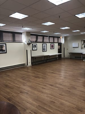 Interior view of a common area with wooden floor