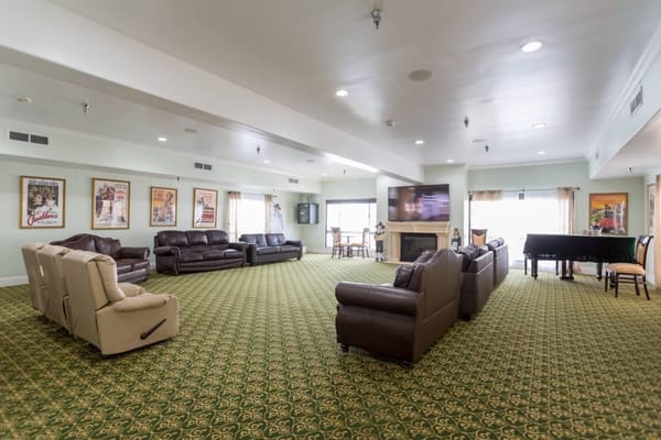 Interior common area with seating and piano