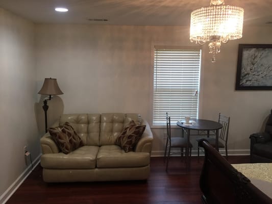 Cozy interior living space with a couch and dining table