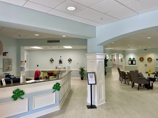 Reception area with a front desk and seating