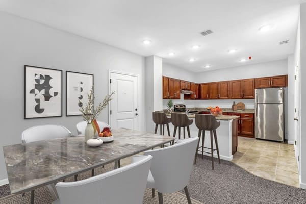Modern kitchen and dining area in a senior apartment