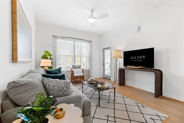 Bright and inviting common area with cozy furniture