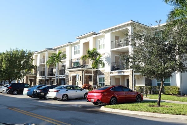 Exterior view of the facility with parking and landscaping