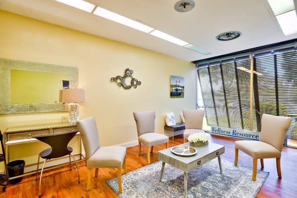 Bright common area with seating and decor