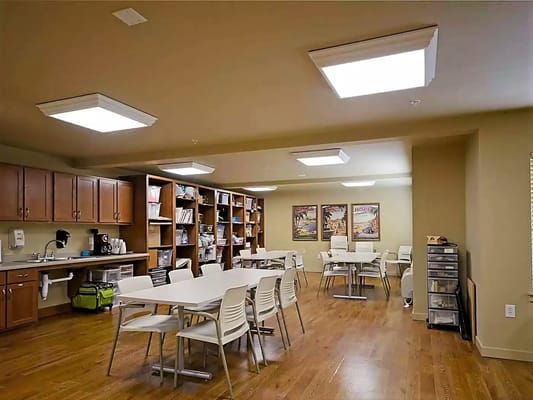 Interior view of a dining area with tables and chairs