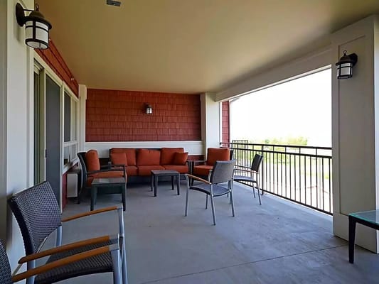 Seating area on a covered patio with views