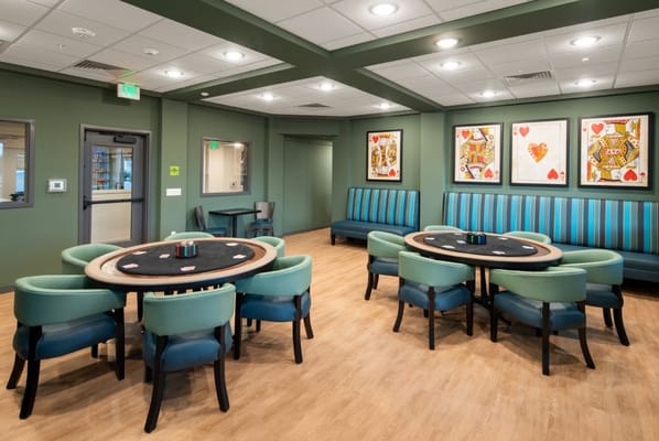 Interior view of a game room with poker tables