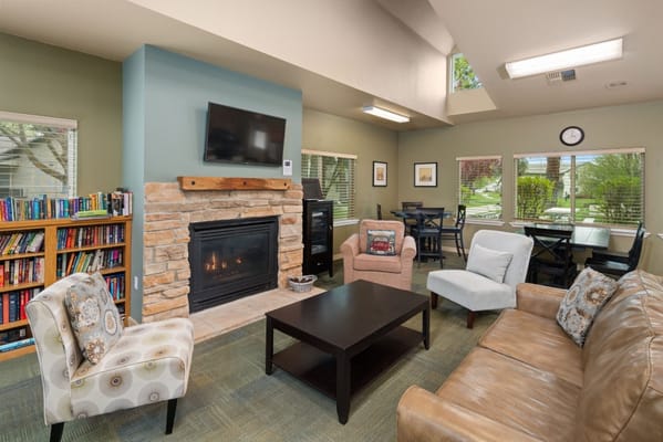 Cozy common area with seating and fireplace