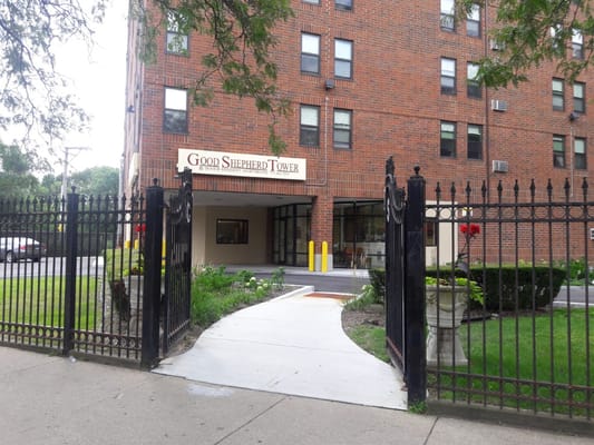 Exterior view of Good Shepherd Tower entrance