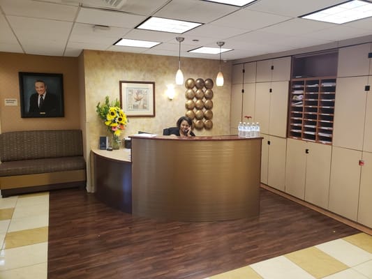 Reception desk with staff member at Rego Park Health Care