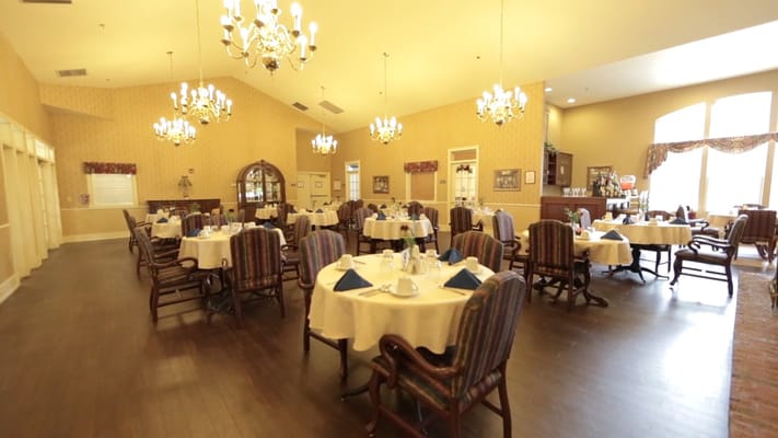 Dining room set for a meal with elegant decor