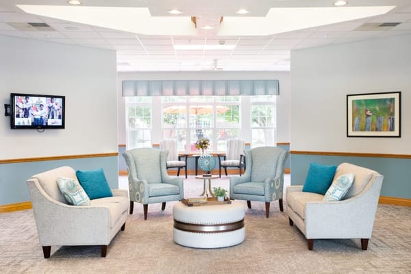 Inviting living room with comfortable seating and a decorative table.
