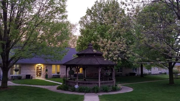 A gazebo surrounded by trees in the courtyard of Tanglewood Village.