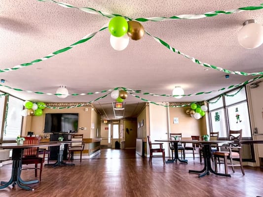 Common area decorated for an event with balloons