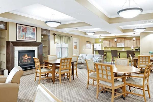 Cozy common area with seating and a fireplace