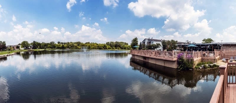 View of a scenic outdoor space with a lake