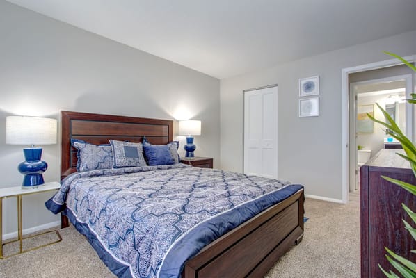 Well-decorated private bedroom in a senior living apartment