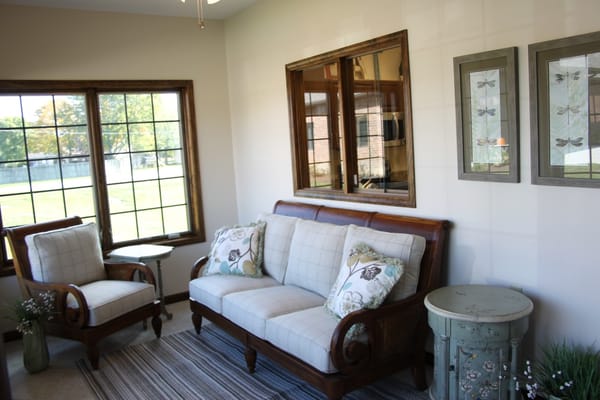 A comfortable sitting area with floral decor