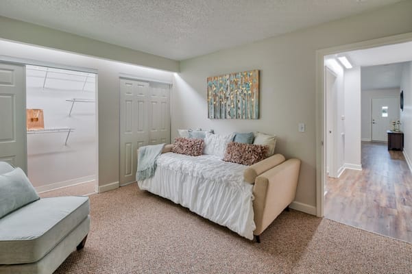 Well-furnished living room with a sofa and artwork