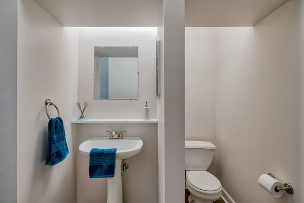 Bright bathroom with a sink and toilet