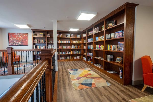 Interior view of a cozy library space with bookshelves