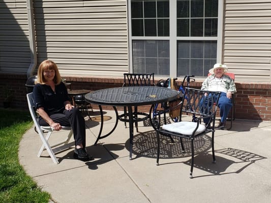 Residents enjoying an outdoor patio space