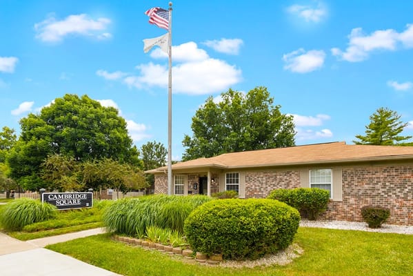 Exterior view of Cambridge Square Apartments with landscaping
