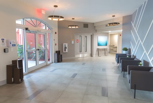Bright interior lobby with seating and natural light