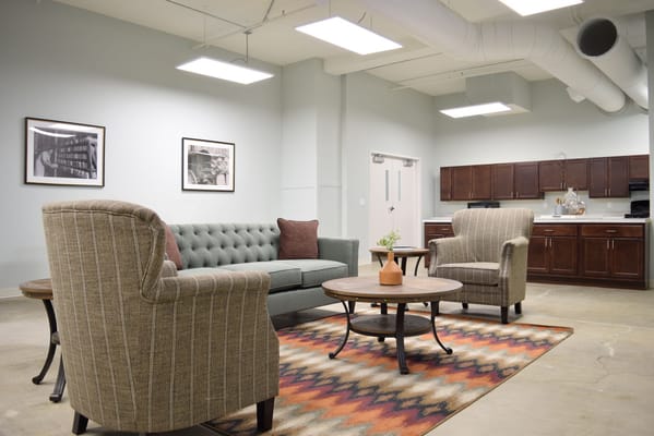 Comfortable lounge area with seating and kitchenette