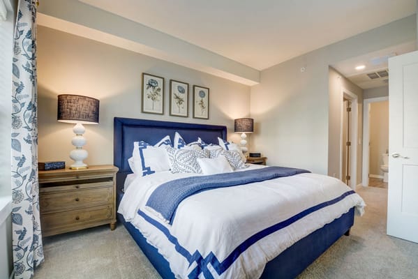 Cozy resident room with a stylish bed and decor