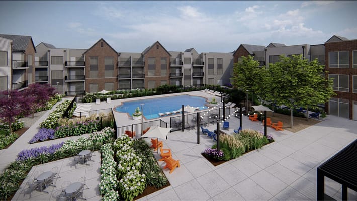 Outdoor pool area with seating and landscaping