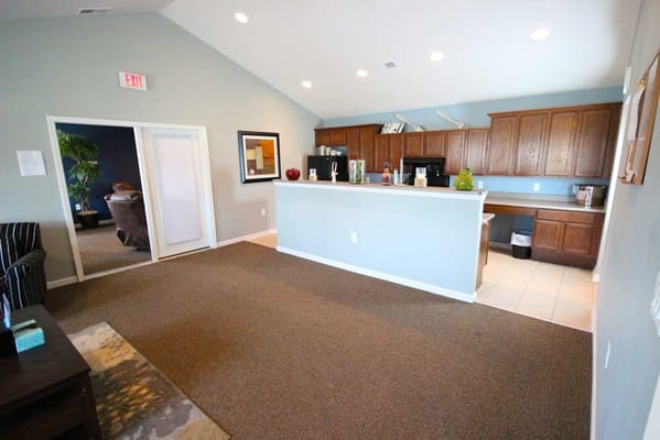 Interior shot of a common area with kitchen space
