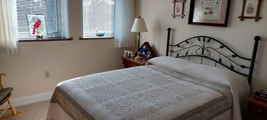 Cozy private resident room with a bed and decorations
