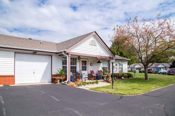 Exterior of a senior living facility with landscaping