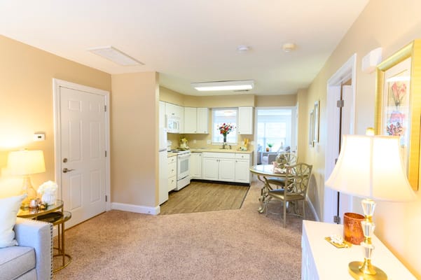 Bright interior of a senior living apartment with kitchen