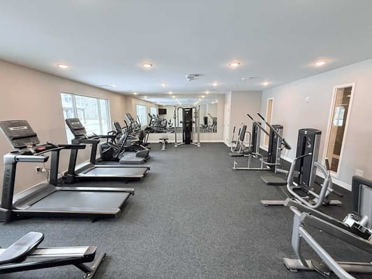 Interior view of a fitness center with exercise equipment